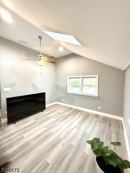 62 Wolfe Road, Unit 63 Budd Lake, NJ 07828 - Photo 14 of 19 a view of an empty room and kitchen with window