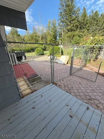 a view of roof deck with patio