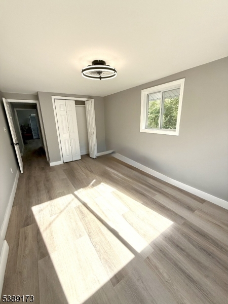 62 Wolfe Road, Unit 63 Budd Lake, NJ 07828 - Photo 8 of 19 an empty room with windows