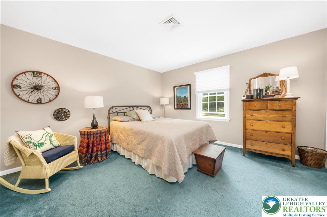 5616 Snowdrift Road Orefield, PA 18069 - Photo 19 of 36 Well-lit and tranquil, this bedroom provides a serene retreat.
