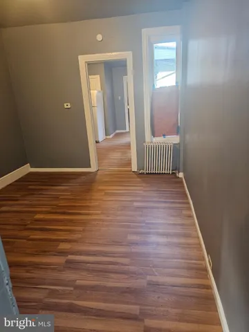 a view of a livingroom from a hallway