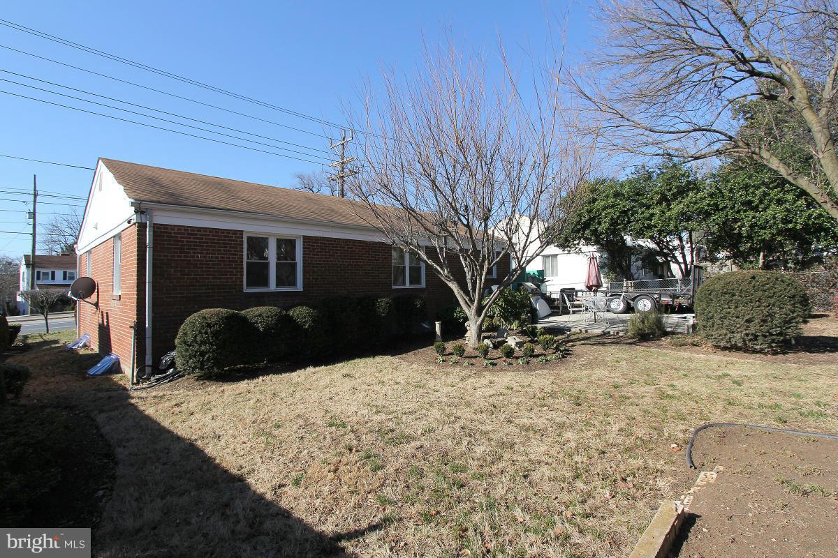 224 University Boulevard East Silver Spring, MD 20901 - Photo 27 of 30 a view of house with yard covered in snow