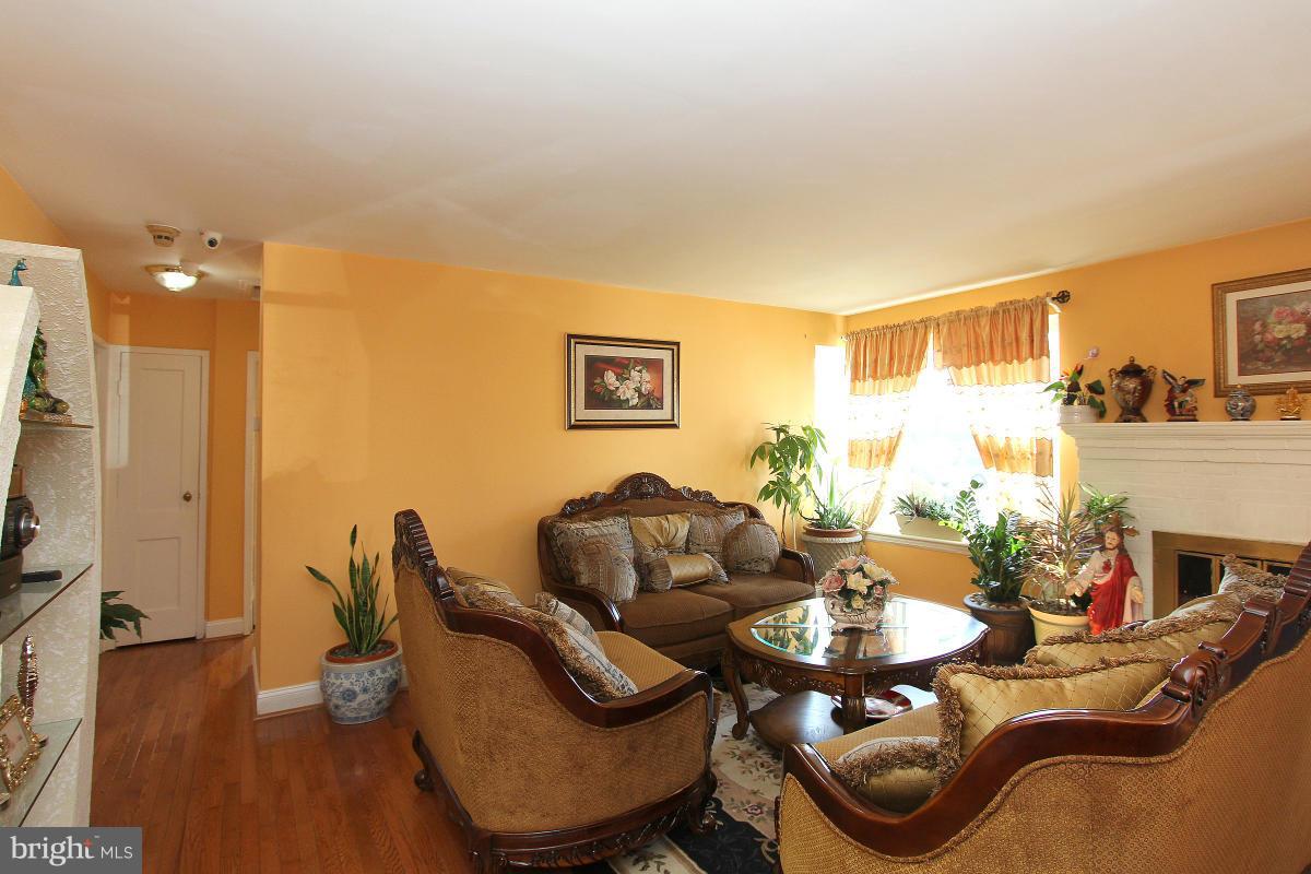224 University Boulevard East Silver Spring, MD 20901 - Photo 5 of 30 a dining room with furniture and wooden floor
