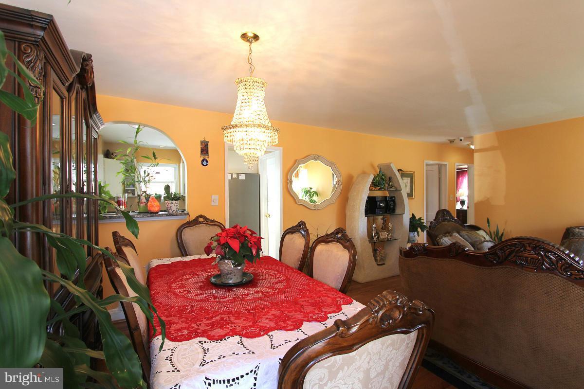 224 University Boulevard East Silver Spring, MD 20901 - Photo 7 of 30 a view of a dining room with furniture