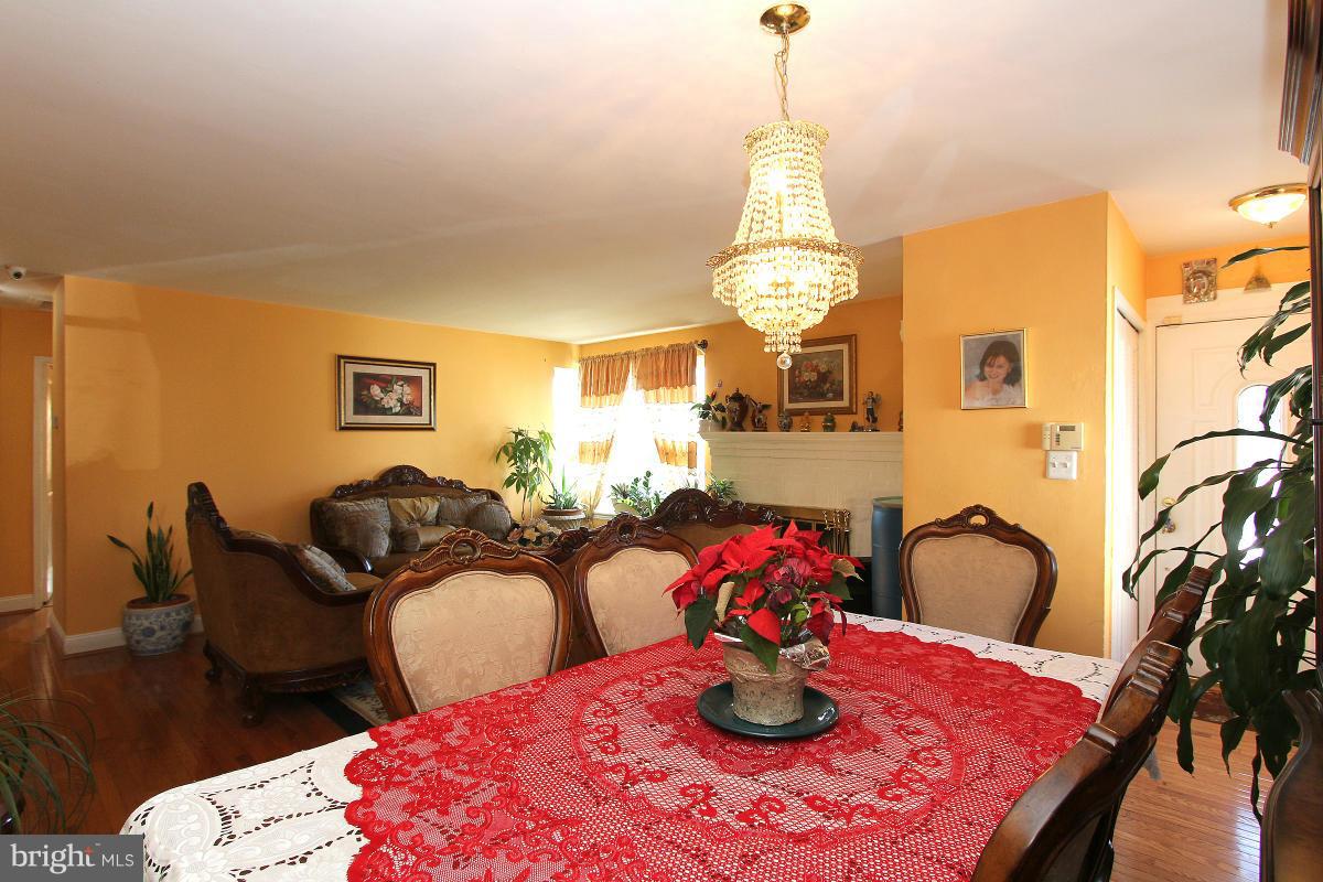 224 University Boulevard East Silver Spring, MD 20901 - Photo 8 of 30 a view of a dining room with furniture