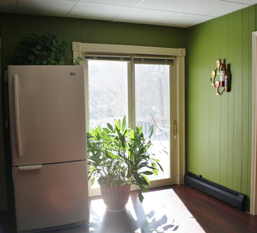67 Pleasant Street Springvale, ME 04083 - Photo 13 of 35 Atrium door leads to deck where you...