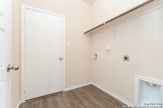 a view of small space with wooden floor