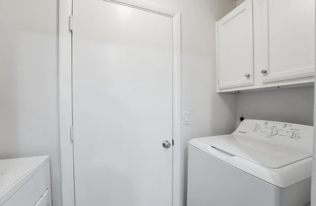 a view of bathroom with washing machine