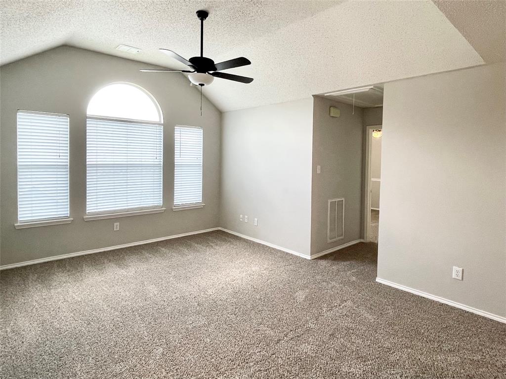 7205 Prairie Flower Lane Frisco, TX 75033 - Photo 16 of 23 wooden floor in an empty room with a window