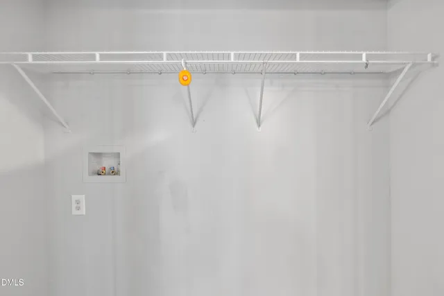 a view of a refrigerator and a window