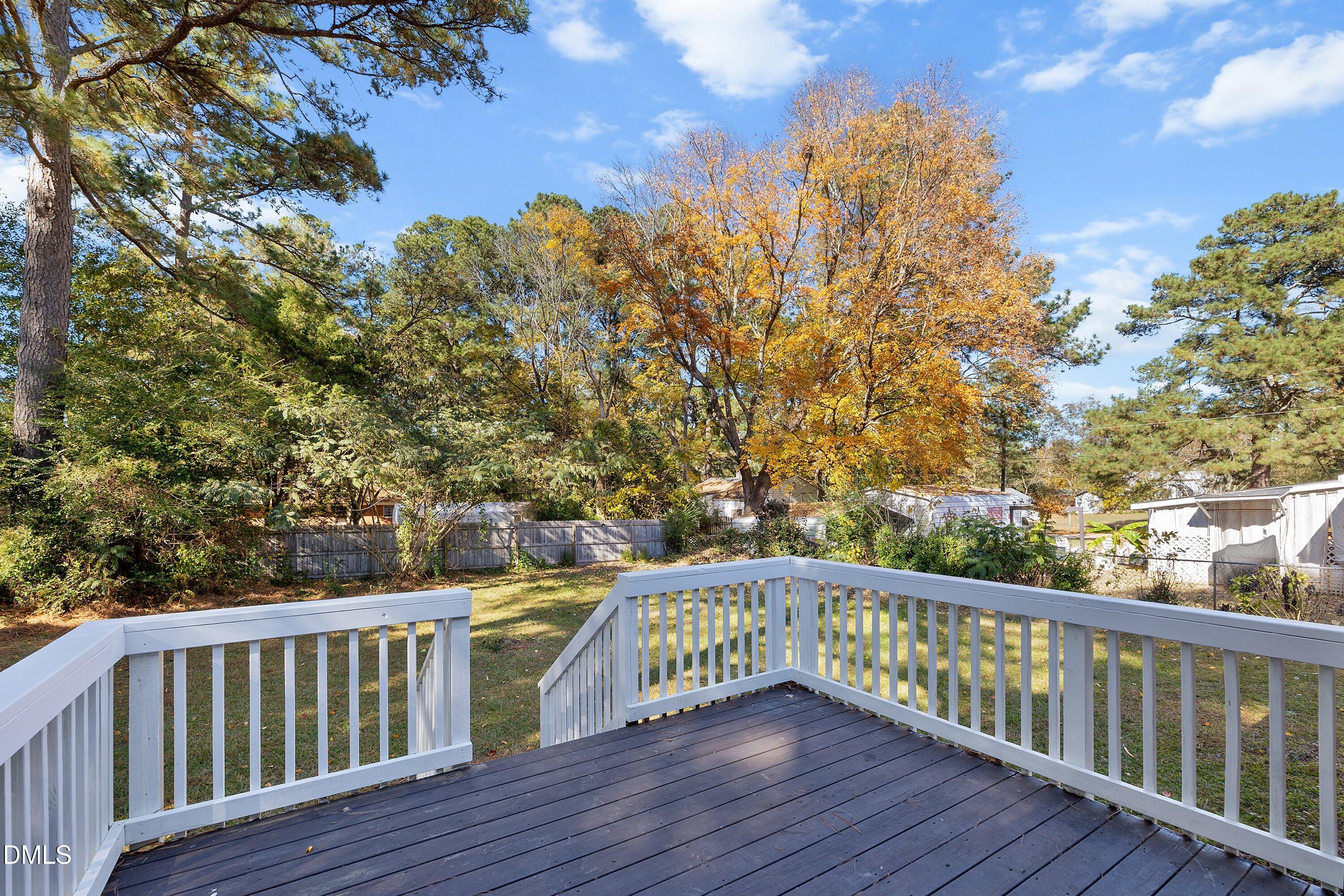 506 West Branch Street Spring Hope, NC 27882 - Photo 34 of 42 a view of roof deck with wooden floor and fence