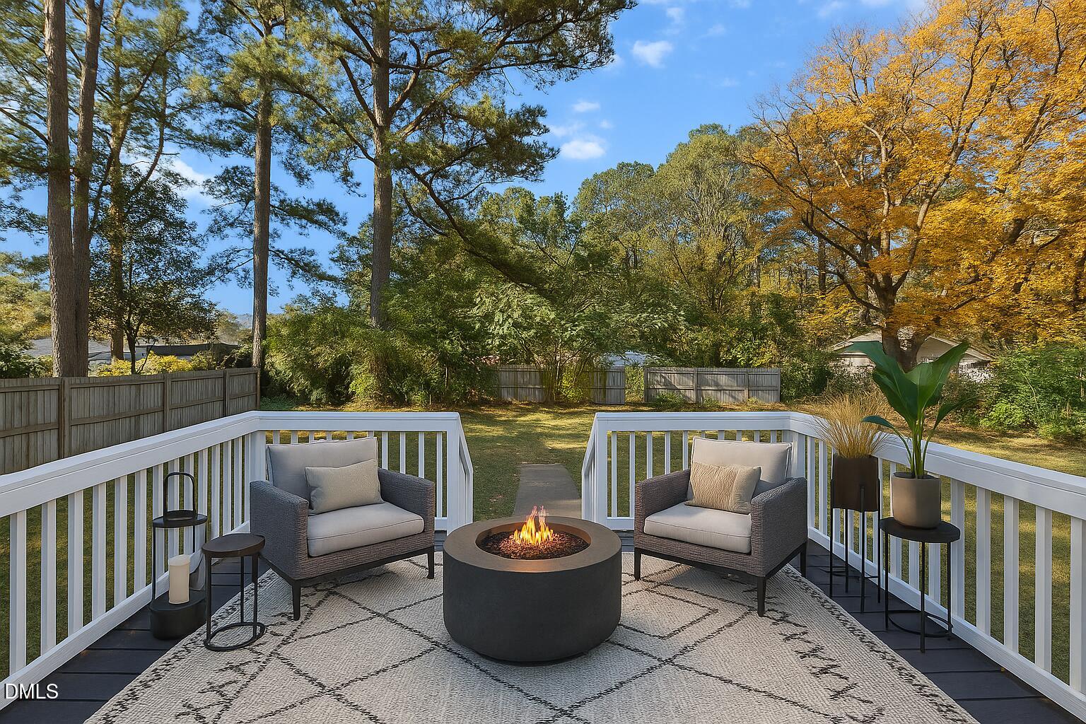506 West Branch Street Spring Hope, NC 27882 - Photo 35 of 42 a view of couches and a potted plant on a roof deck