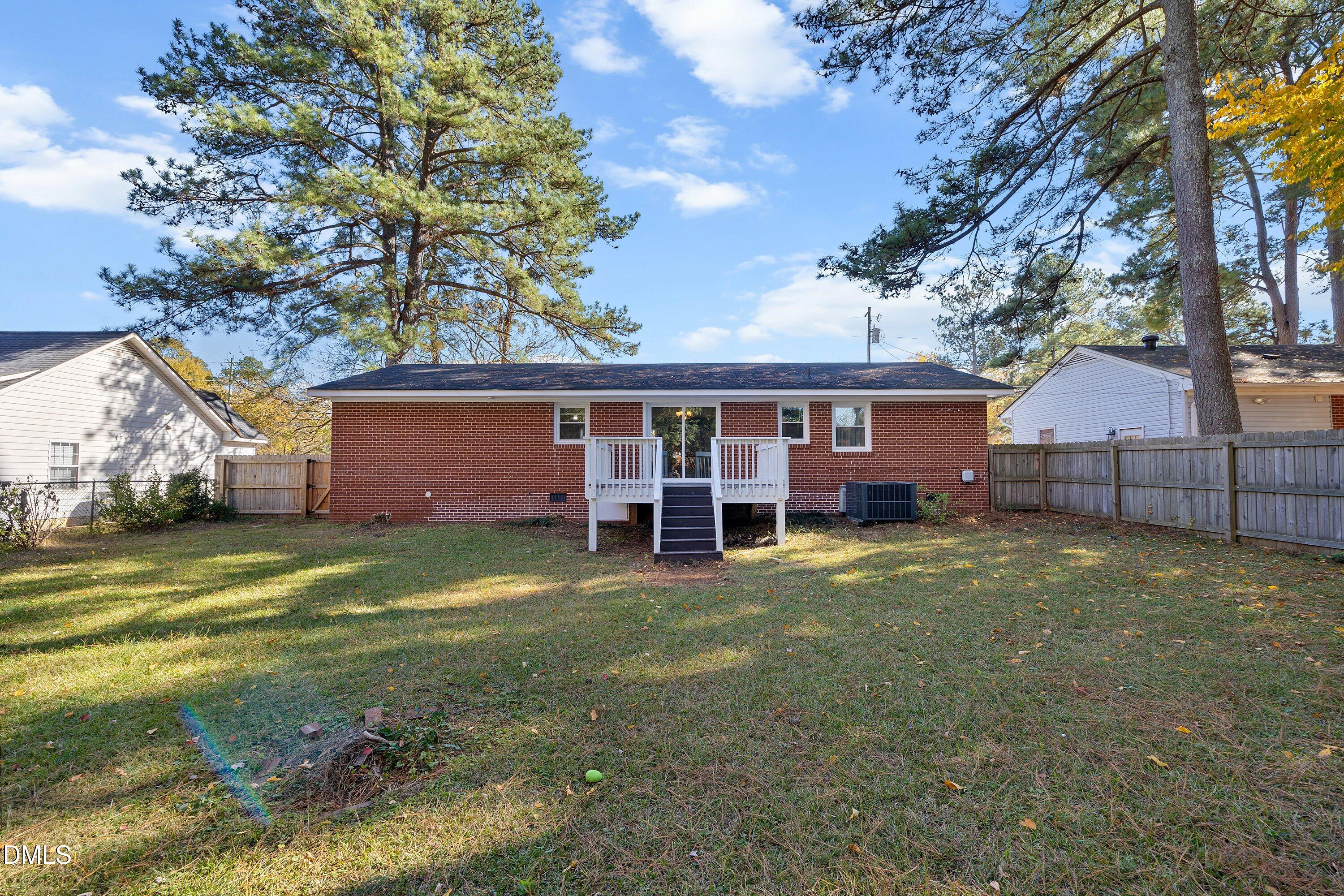 506 West Branch Street Spring Hope, NC 27882 - Photo 37 of 42 a view of a house with a backyard