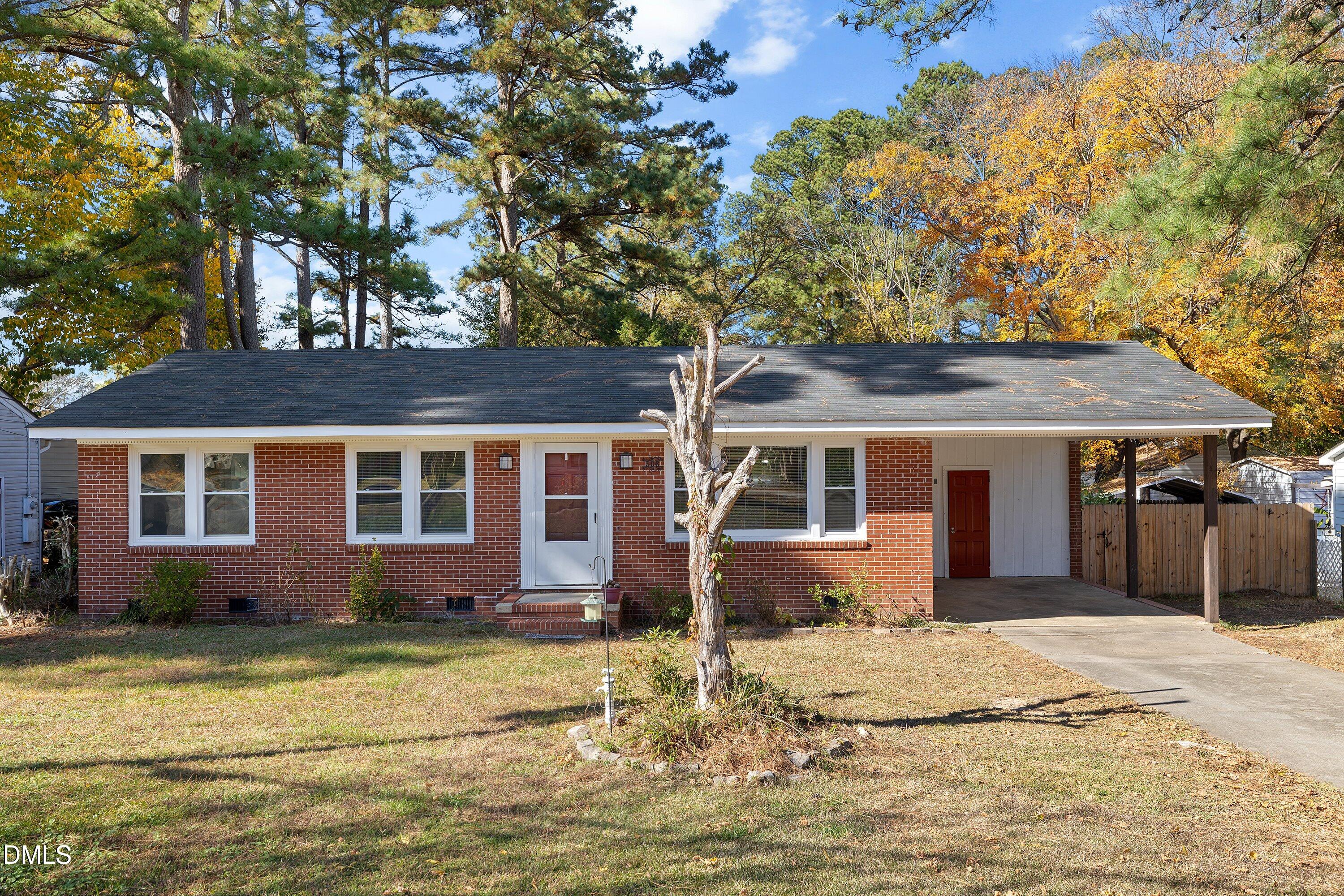 506 West Branch Street Spring Hope, NC 27882 - Photo 42 of 42 a front view of a house with a garden