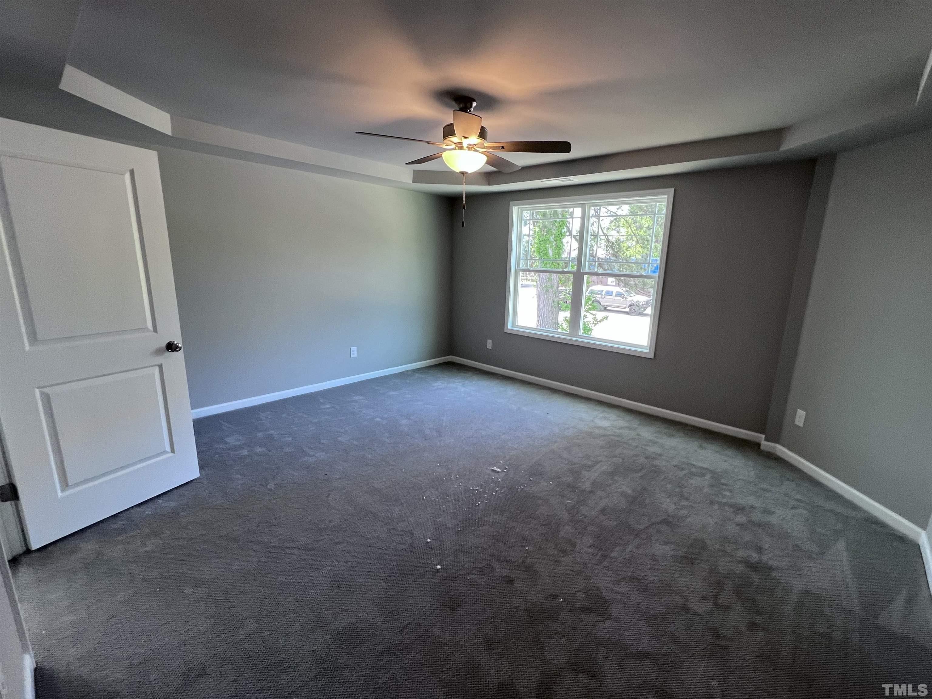 204 West Main Street Micro, NC 27576 - Photo 8 of 14 a view of an empty room with a window