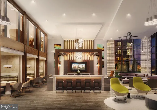 a bathroom with a sink a toilet and a shower