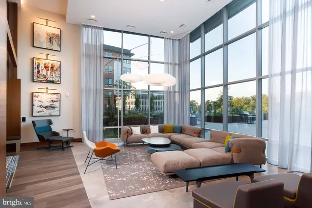 a city street lined with buildings and trees