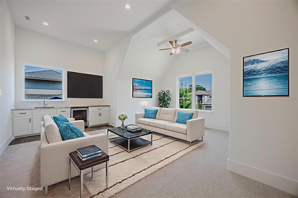 2081 Holt Way Grapevine, TX 76051 - Photo 24 of 39 a living room with furniture and a flat screen tv