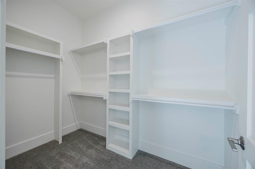 2081 Holt Way Grapevine, TX 76051 - Photo 29 of 39 a view of an empty walk in closet