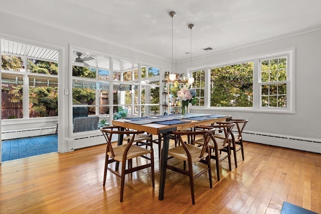 44 Rolling Lane Newton, MA 02467 - Photo 6 of 18 a dining room with furniture window wooden floor