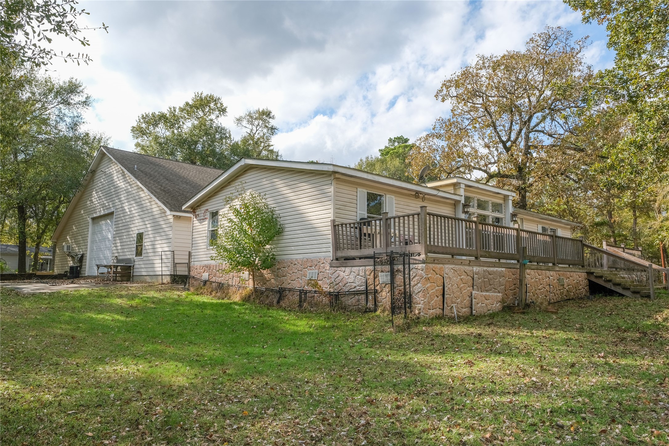 170 W Creek Trinity, TX 75862 - Photo 20 of 47 a view of a backyard with a garden and plants
