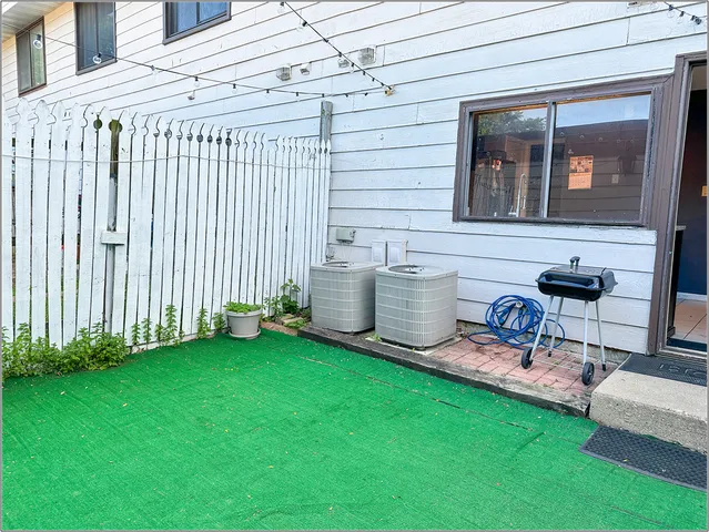 a house view with a garden space