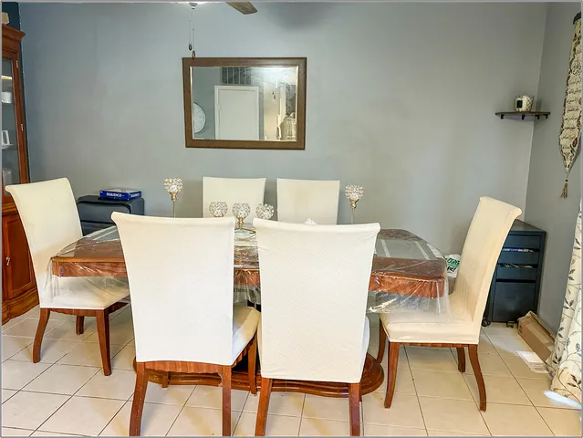 a dining room with a table and chair