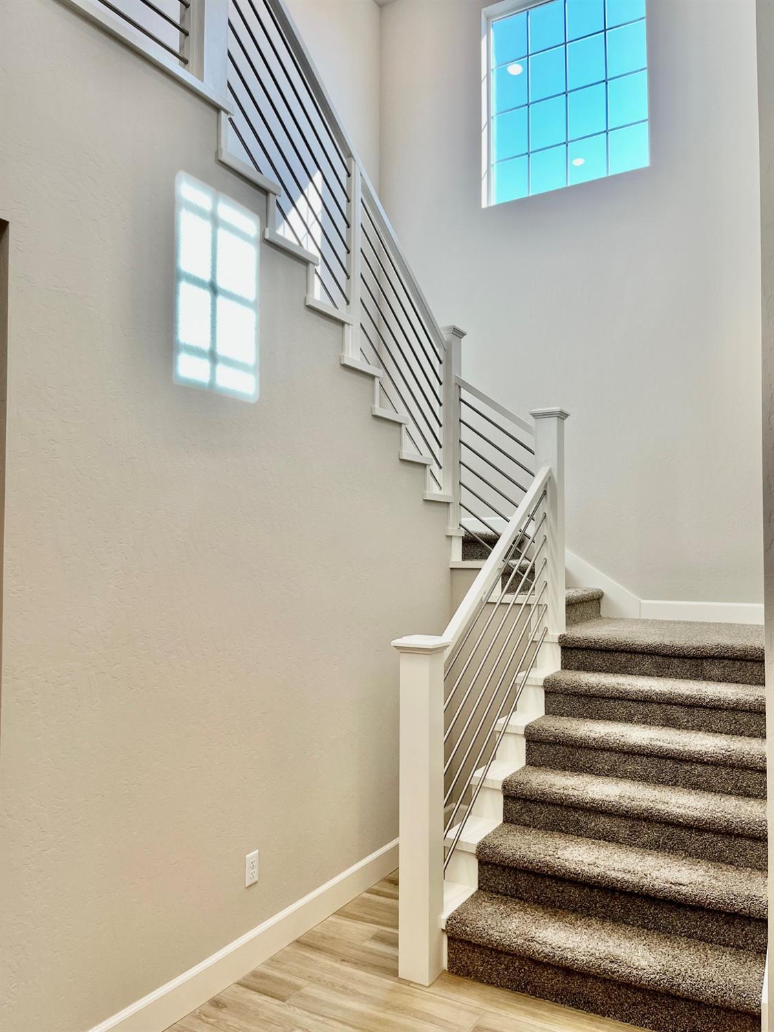 465 Bloom Lane Clovis, CA 93619 - Photo 5 of 16 a view of entryway and hall with wooden floor