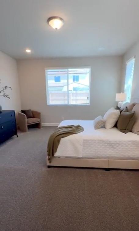 465 Bloom Lane Clovis, CA 93619 - Photo 10 of 16 a bedroom with bed and window