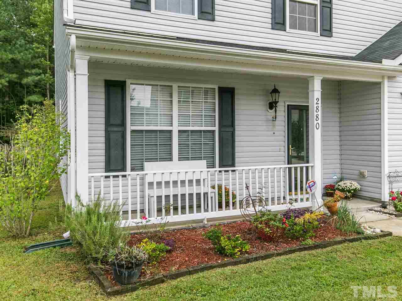 2880 Orchard Trace Way Raleigh, NC 27610 - Photo 2 of 22 Enjoy over-looking the neighborhood sitting out on your covered porch.