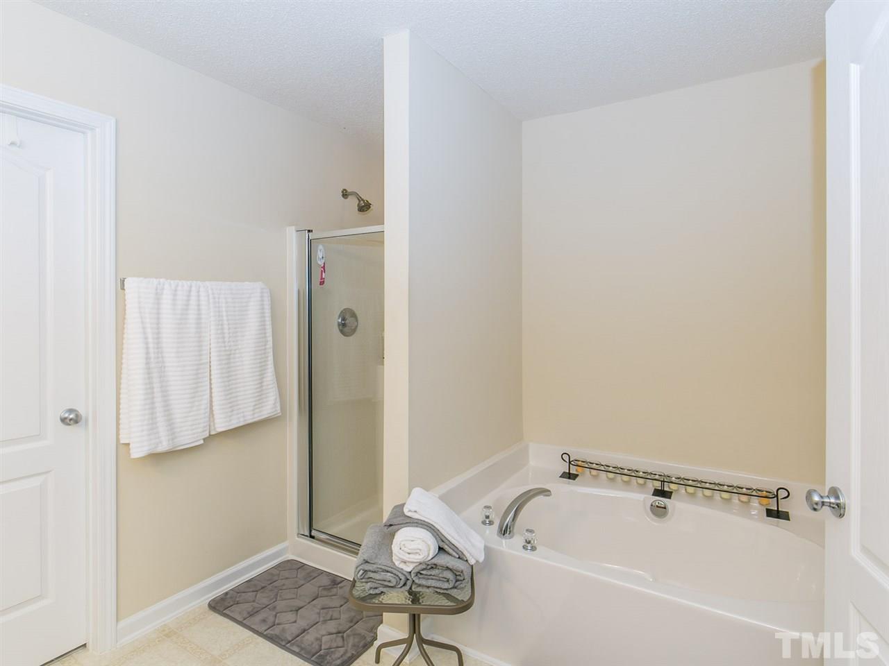 2880 Orchard Trace Way Raleigh, NC 27610 - Photo 14 of 22 Large master bathroom with separate shower and garden tub.
