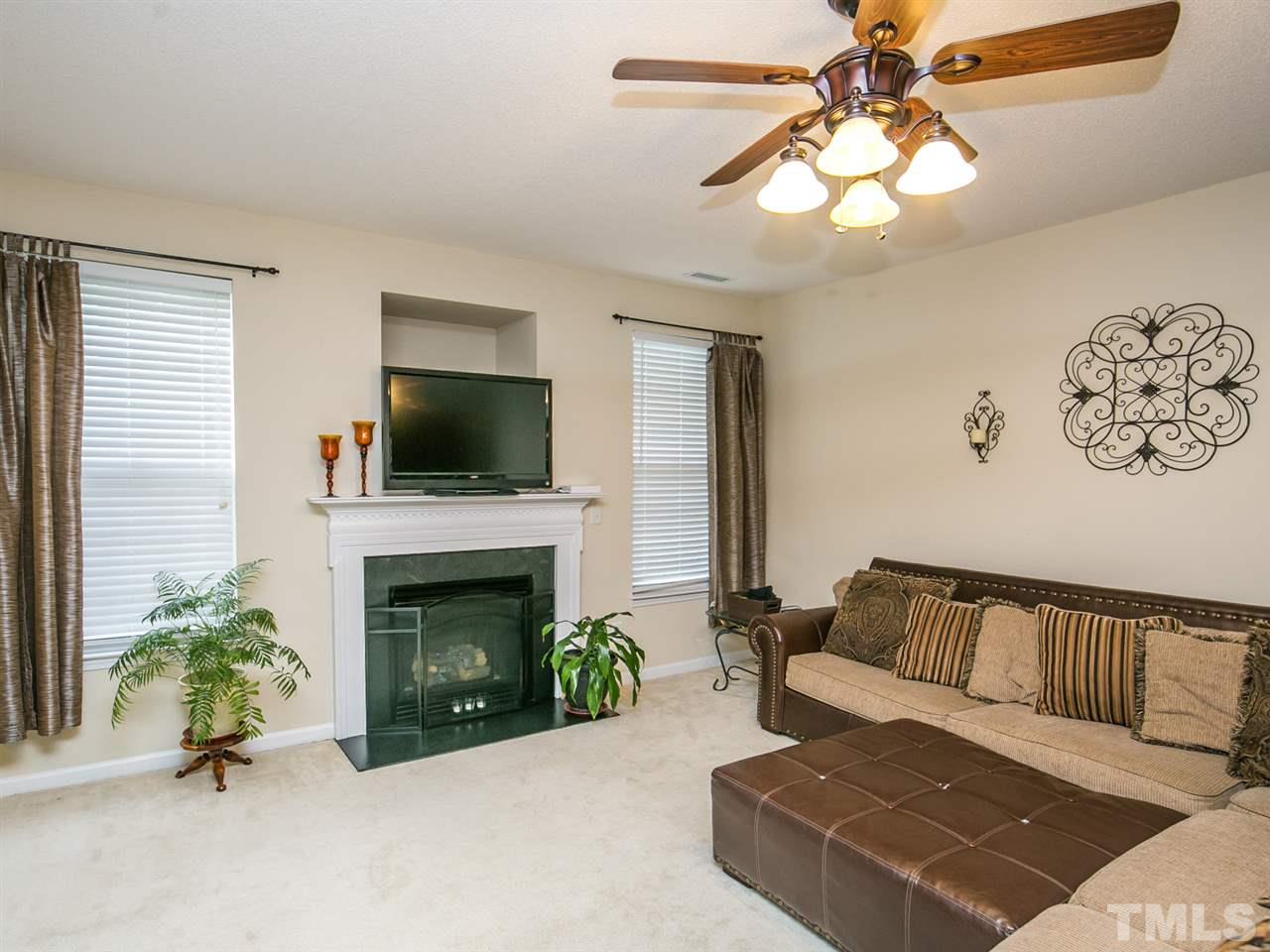 2880 Orchard Trace Way Raleigh, NC 27610 - Photo 7 of 22 Large family room with gas fireplace.