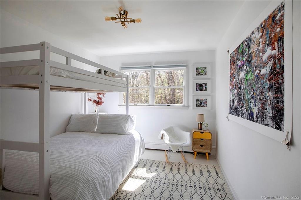 10 Sentry Hill Road Roxbury, CT 06783 - Photo 13 of 28 a bedroom with a bed and a window
