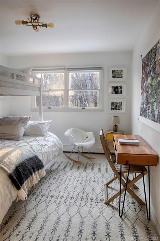 10 Sentry Hill Road Roxbury, CT 06783 - Photo 14 of 28 a bedroom with a bed and a table in it