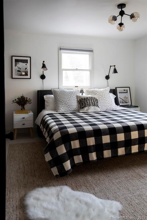 10 Sentry Hill Road Roxbury, CT 06783 - Photo 15 of 28 a bedroom with a bed and window