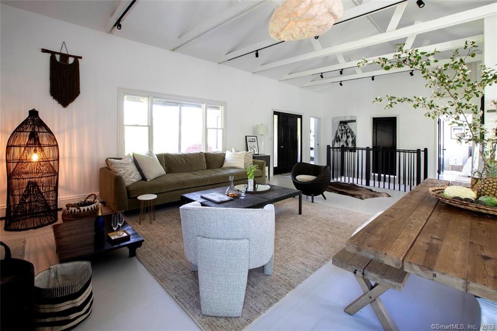 10 Sentry Hill Road Roxbury, CT 06783 - Photo 3 of 28 a living room with furniture and a flat screen tv