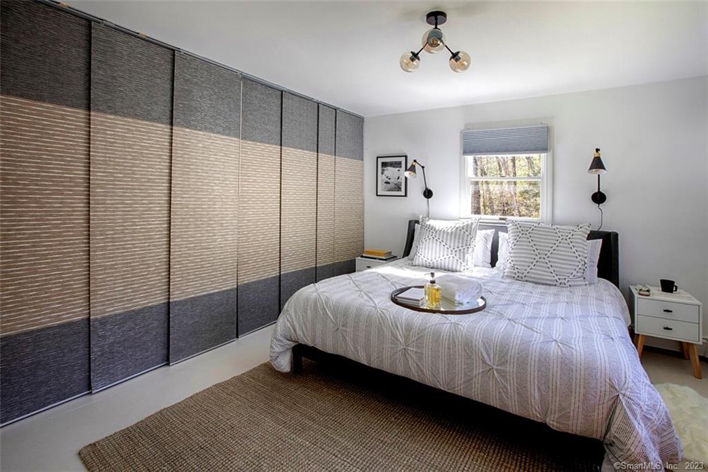 10 Sentry Hill Road Roxbury, CT 06783 - Photo 10 of 28 a bedroom with a bed and window
