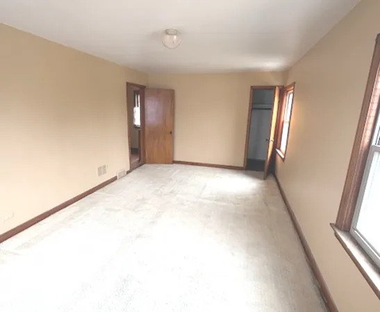 a view of empty room with window