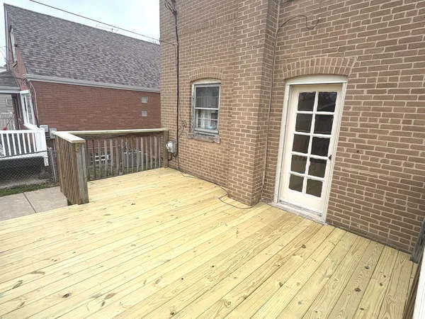 a view of a balcony with a door