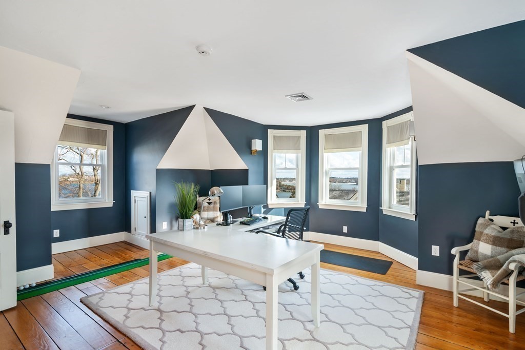 4 Mann Street Hingham, MA 02043 - Photo 17 of 22 a living room with furniture a table and a large window