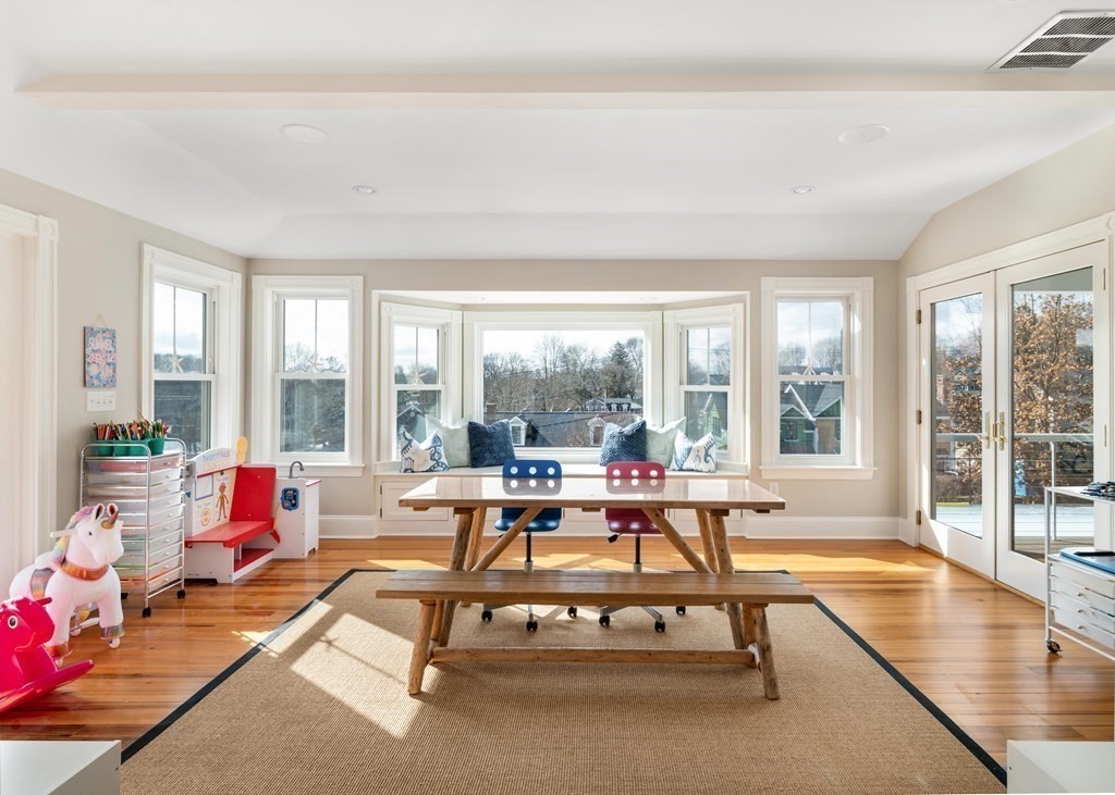 4 Mann Street Hingham, MA 02043 - Photo 9 of 22 a living room with furniture large windows and wooden floor