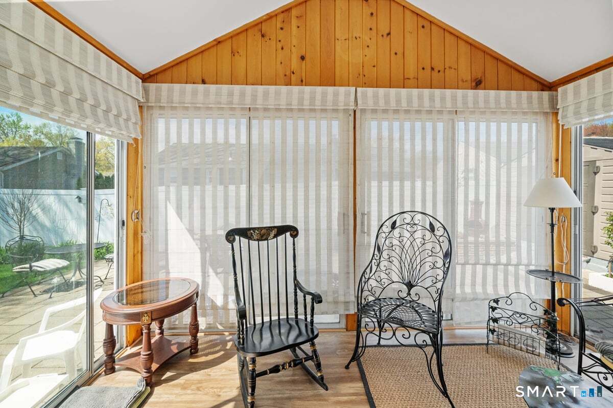 21 Brookside Circle Wethersfield, CT 06109 - Photo 21 of 39 a view of chair and table in the balcony
