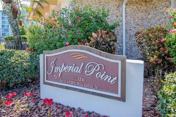 a sign that is on the wall of the building