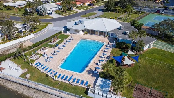 an aerial view of a house swimming pool and outdoor space