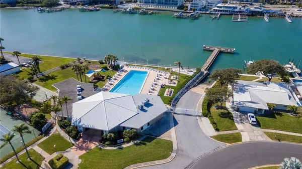 an aerial view of a house with a lake view