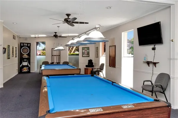 a room with furniture and a flat screen tv