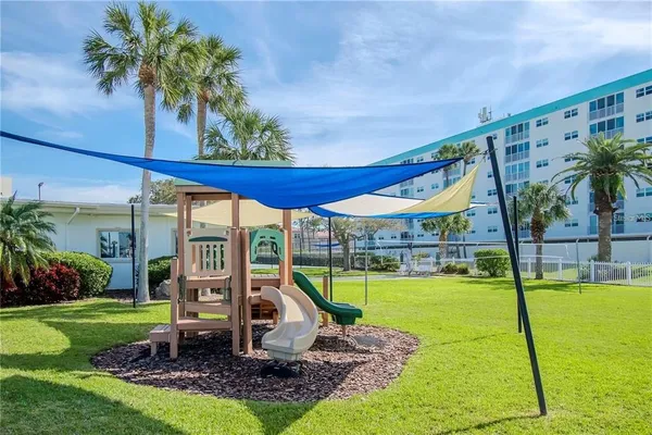a view of a garden with a slide
