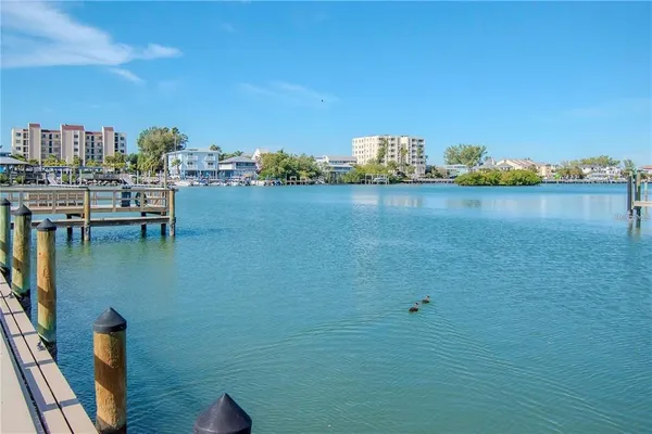 a view of a lake with a city