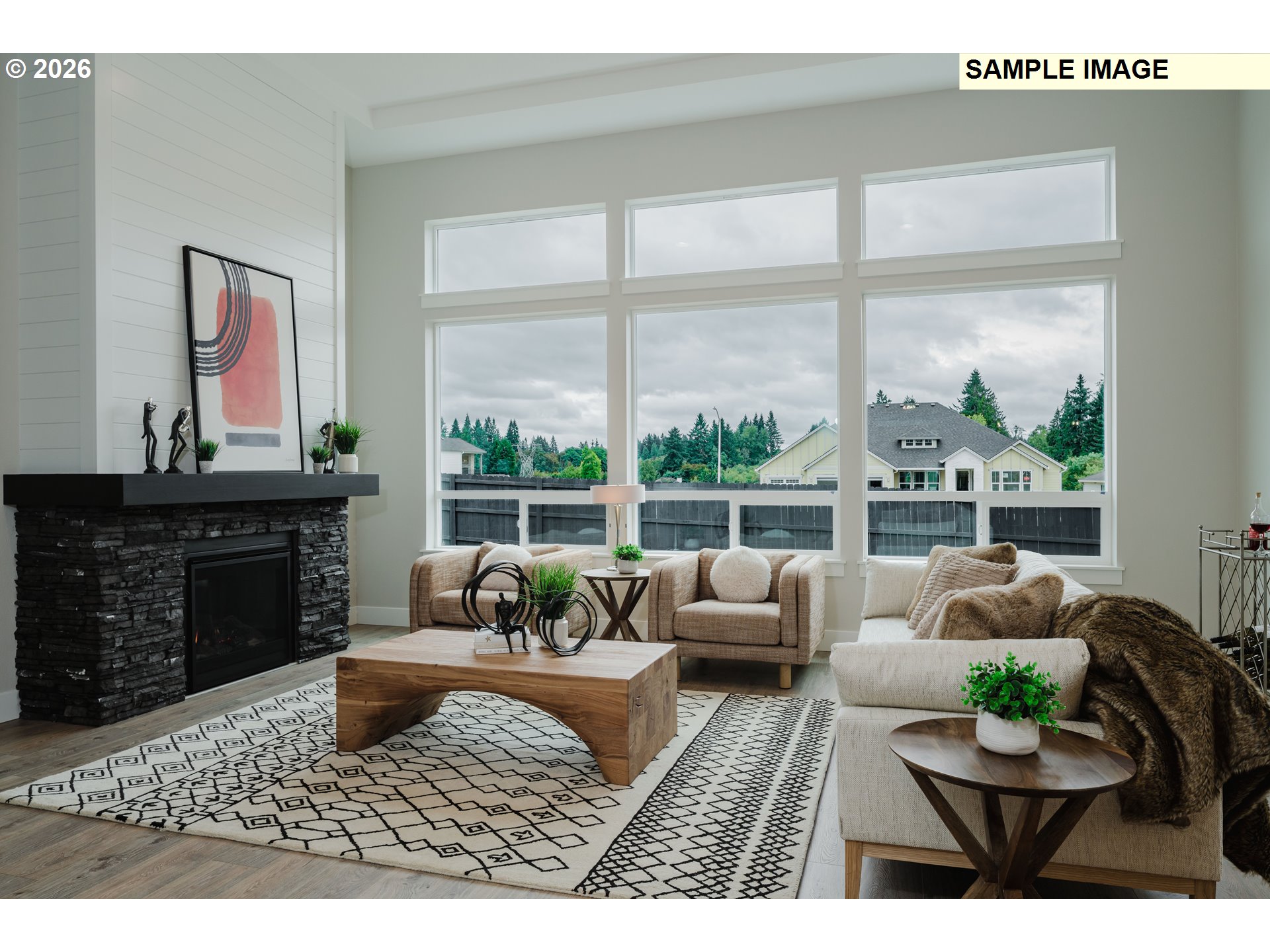 1403 North 41st Place Ridgefield, WA 98642 - Photo 10 of 30 a living room with furniture windows and a fireplace