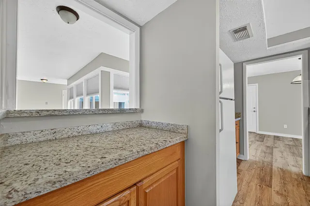 wooden floor with a sink